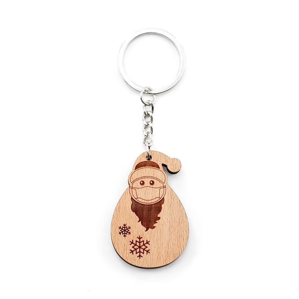 Llavero muñeco de nieve de madera